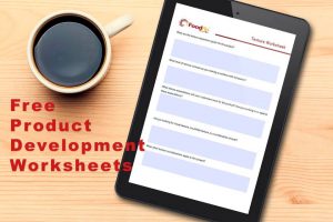Free Product Development Worksheets - header image with tablet showing interactive worksheets on wood table with a cup of coffee