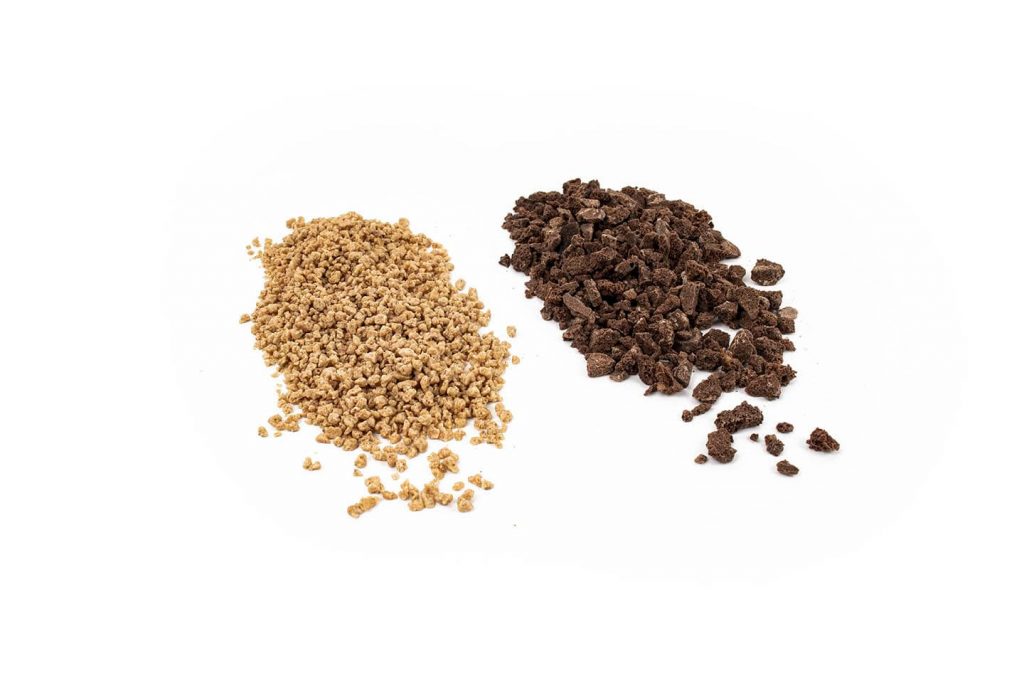Soft Crunch Kibble - Small and Large kibbles side by side (small 2-4mm Spicy Ginger Soft Kibble beside a larger 2-12mm Biscuit Soft Crunch)