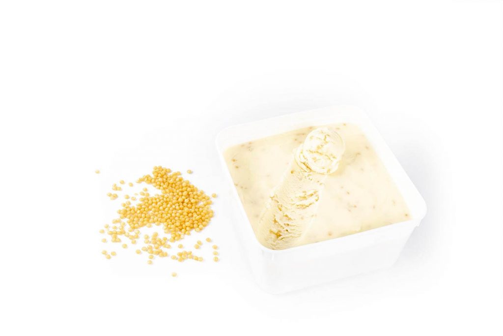 Value Tub of Honeycomb Ice Cream with loose inclusions beside
